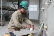 Trabajadores de obra de mejoramiento de vivienda