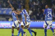 Jugadores de Millonarios celebrando un gol contra el América