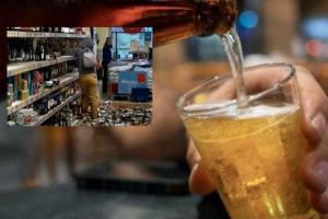 Mujer rompe botellas de licor en supermercado