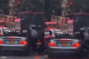 Ladrones en moto robando carro en Bogotá 