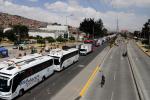 Buses represados en trancón en la Autopista Sur