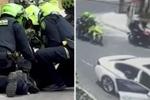 Policías capturando a presuntos ladrones