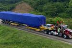 Trenes del Metro de Bogotá viajando por las carreteras del país.