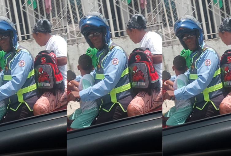 Agente de transito infringiendo normas de tránsito