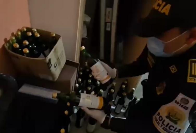 Policía - Licor adulterado