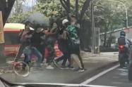 Riña hinchas Nacional