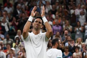 Robert Farah, tenista colombiano, en el All England Club de Londres. Al fondo su compañero Juan Sebastián Cabal