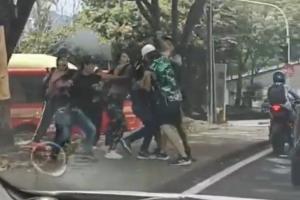 Riña hinchas Nacional