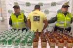 Incautan 120 botellas de licor adulterado ocultas dentro de una camioneta en Santo Domingo