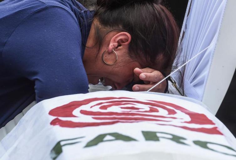 Imagen de uno de los funerales por un exguerrillero asesinado