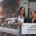 Un año después del incendio en la calle 19, comerciantes reciben la ayuda prometida