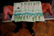 Billetes de 100 mil pesos colombianos