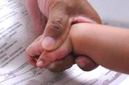 Las dos entidades acordaron eliminar, temporalmente, la presentación personal del niño o niña en la oficina de registro