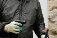 Asaltante con arma