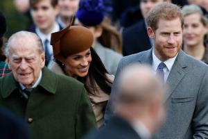 El príncipe Harry, el Príncipe Felipe y Meghan Markle