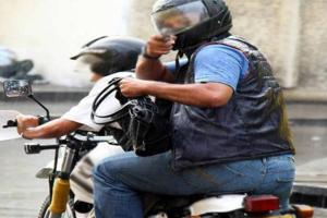 Sujetos armados en moto despojaron de más de $50 millones a una pareja frente a la clínica Keralty