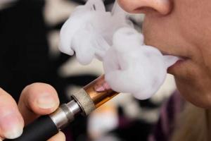person-puffing-and-smoking-an-e-cigarette-16x9.jpg